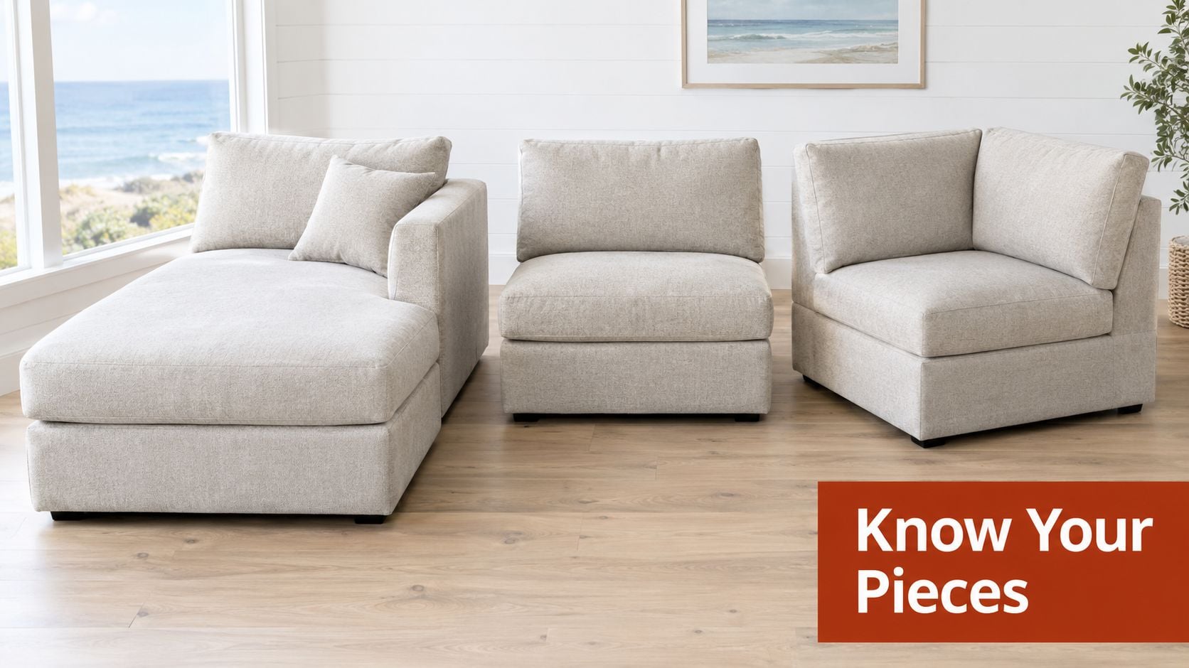 Three modular beige fabric sofa pieces, including a chaise, armless chair, and corner seat, displayed on hardwood flooring.
